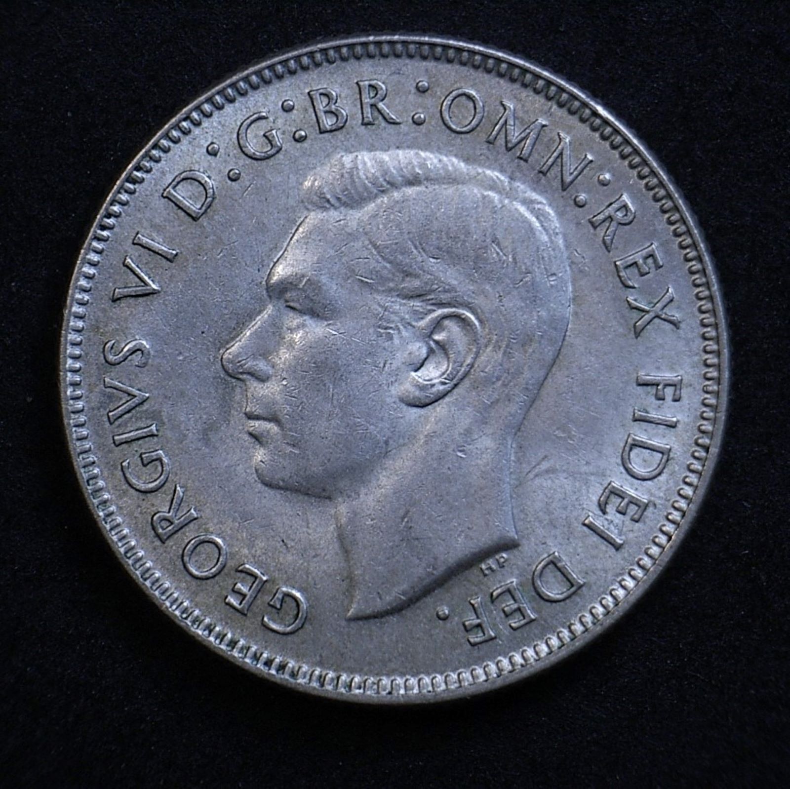 Close up Aussie 1952 florin obverse, new light angle showing the coin's detail