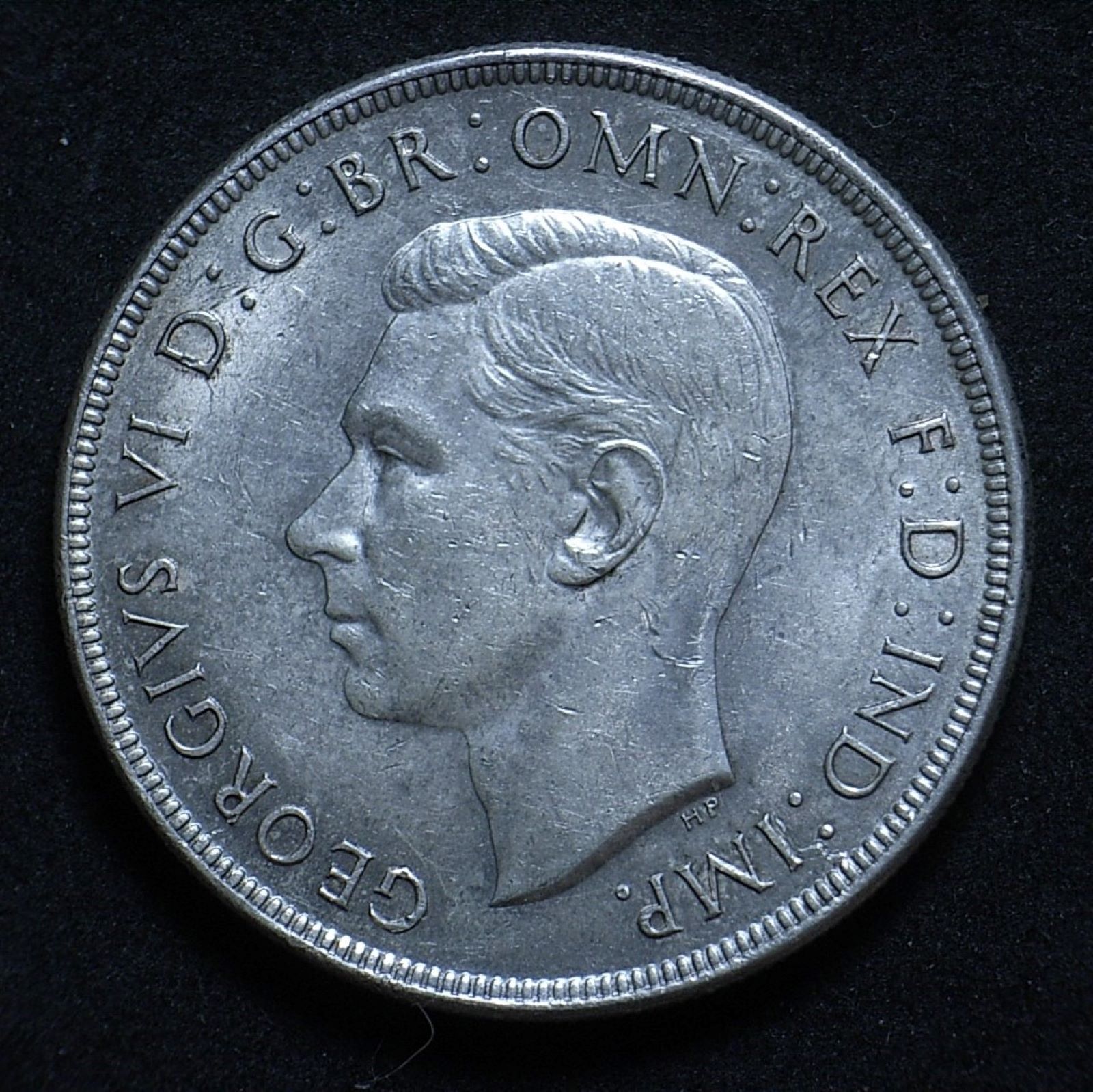 Close up Aussie Crown 1937 obverse, new light angle highlighting the coin's detail