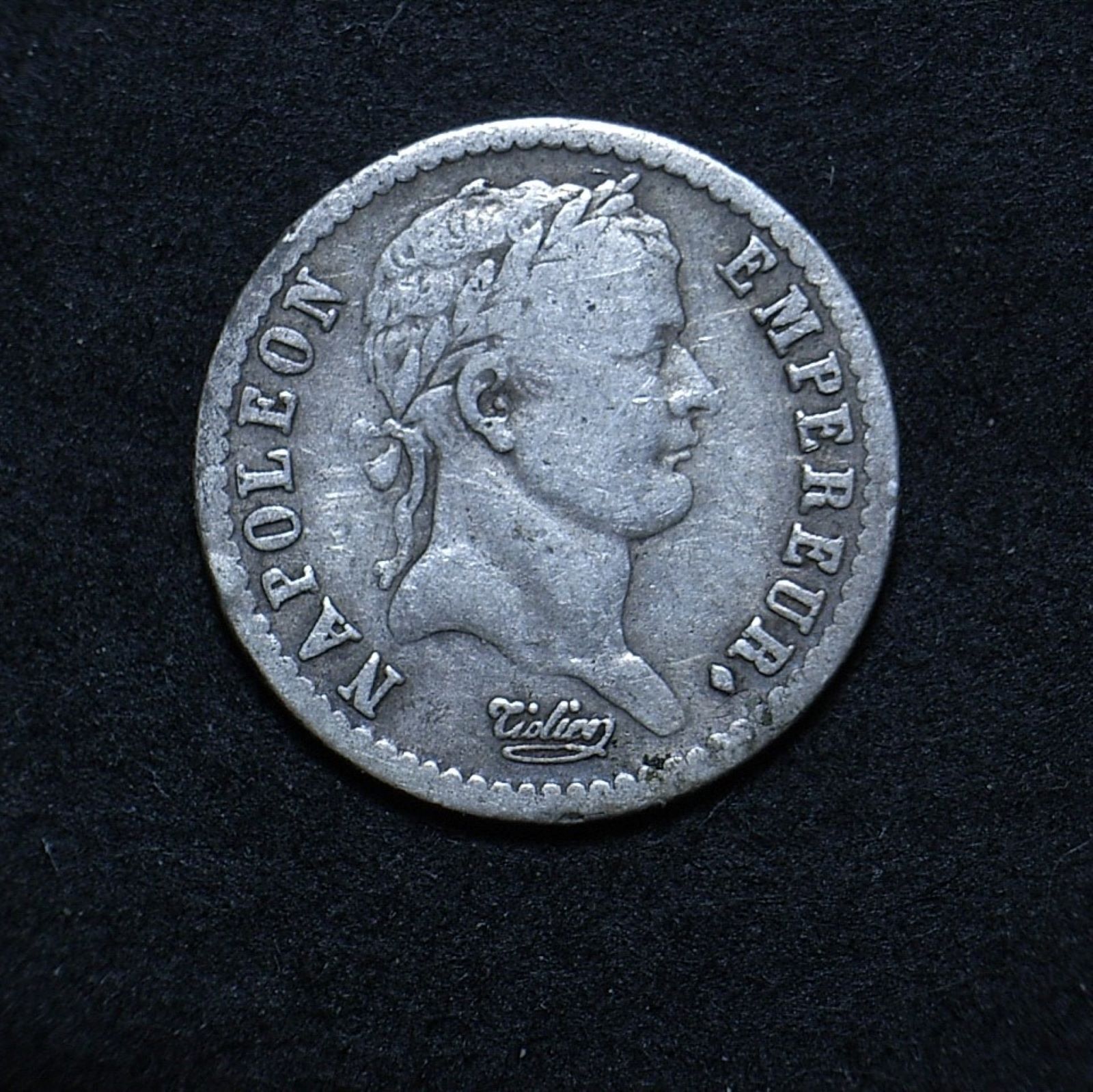 Close up of French 1809 demi franc highlighting Napoleon Bonaparte's portrait
