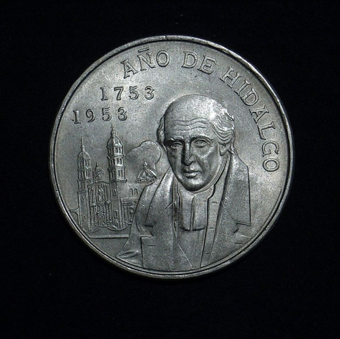 1953 Mexican 5 peso obverse highlighting the coin's lustre