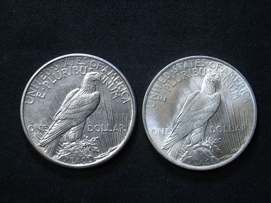 Close up comparison of relief on US 1921 vs 1923 Peace dollar reverse