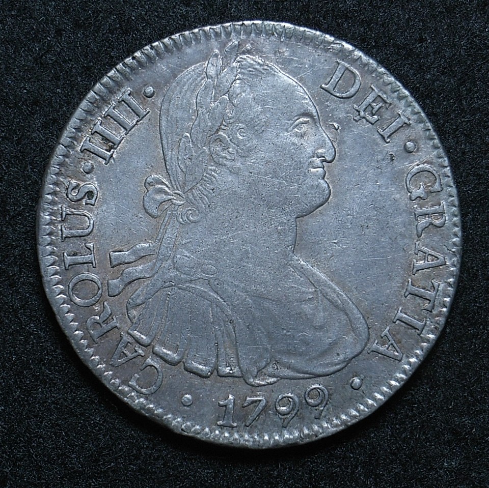 Close up mexico-colonial-spain-8-reales-1799-fm-obv