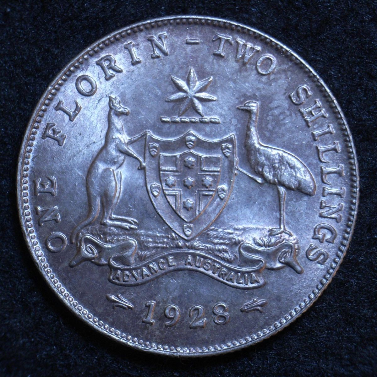 Taking a closer look: Unc 1928 Aus&nbsp;florin…